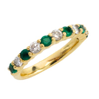 Emerald and diamond band in 18 carat gold
