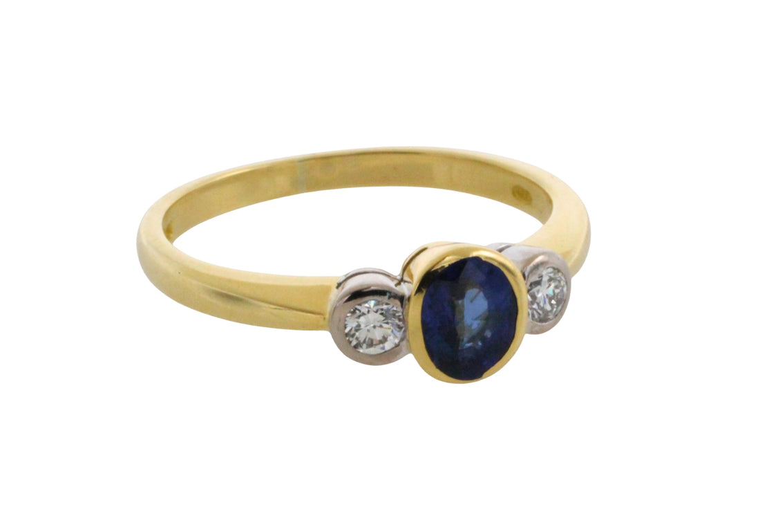 Sapphire and diamond three stone ring