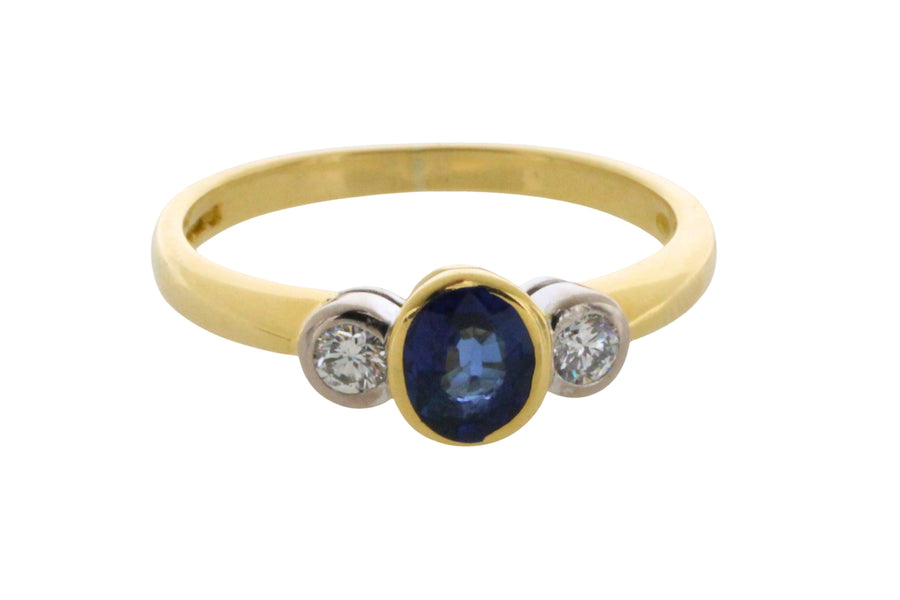 Sapphire and diamond three stone ring