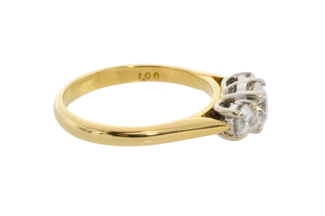 Three stone brilliant cut diamond ring