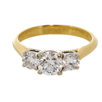 Three stone brilliant cut diamond ring