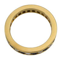 Sapphire and diamond eternity band in 18 carat gold