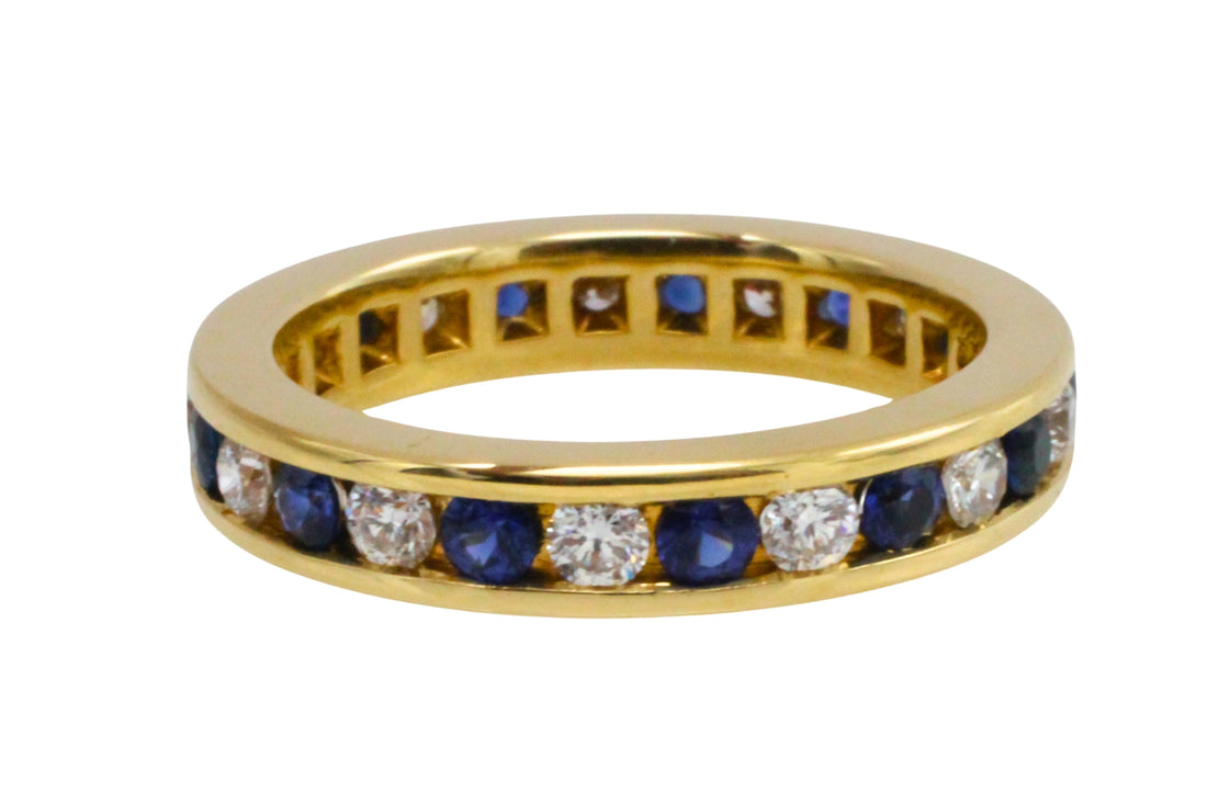 Sapphire and diamond eternity band in 18 carat gold