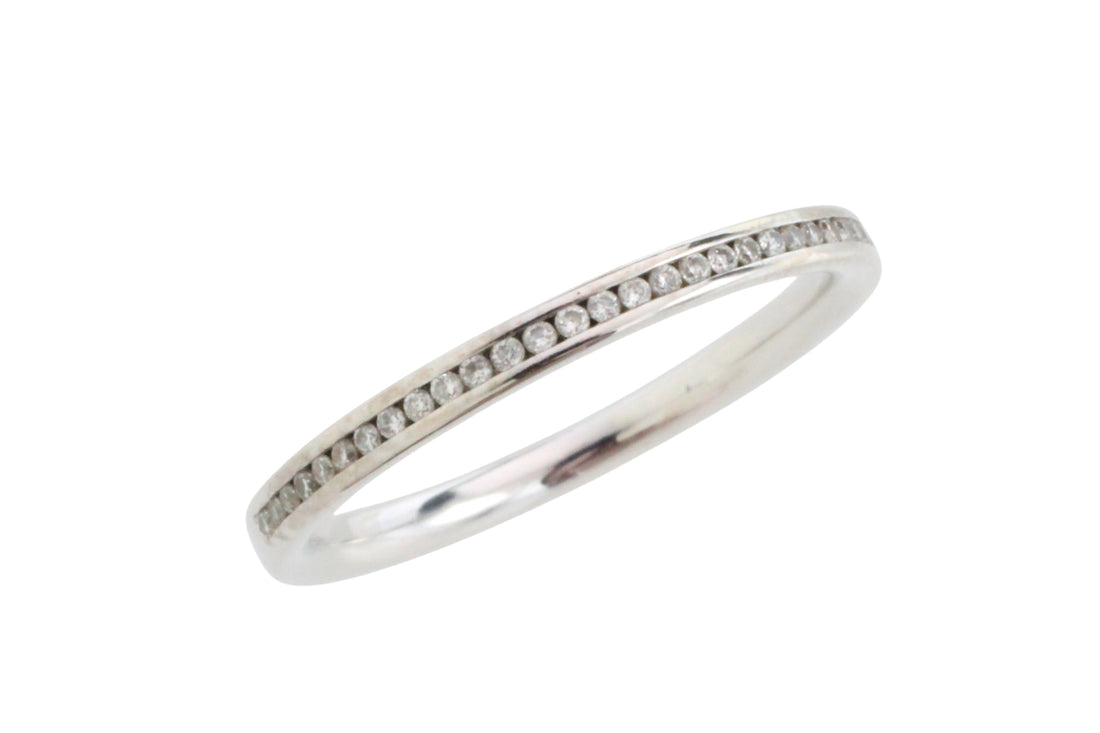 18 carat gold half eternity band with diamonds