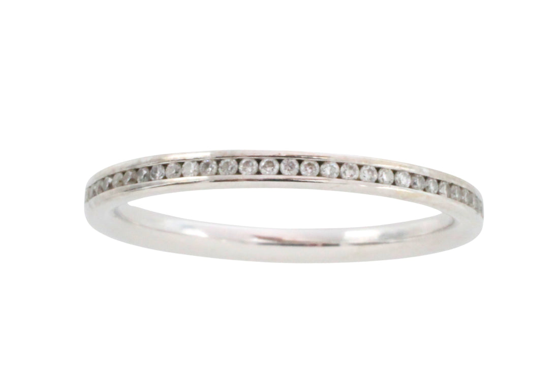 18 carat gold half eternity band with diamonds
