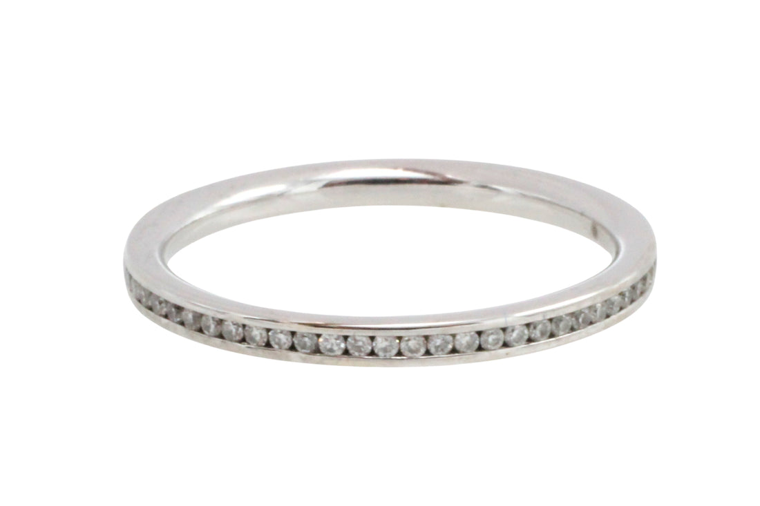 18 carat gold half eternity band with diamonds