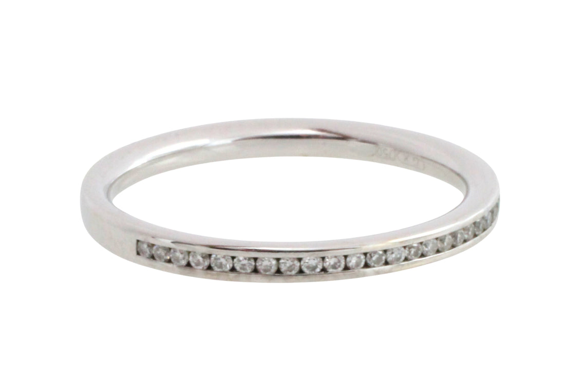 18 carat gold half eternity band with diamonds