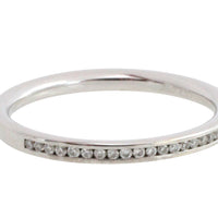18 carat gold half eternity band with diamonds