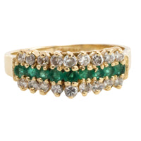 Emerld and diamond ring in 14 carat gold