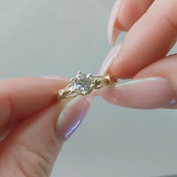 Diamond solitaire ring in 14 carat gold