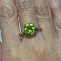 Peridot and diamond ring in 14 carat gold