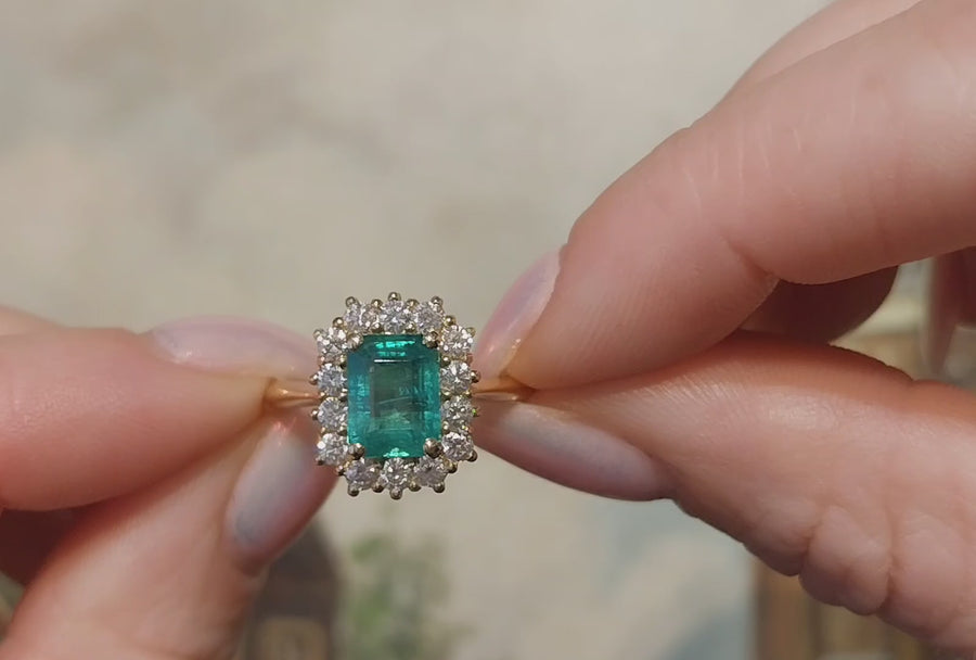 Emerald and diamond ring in 18 carat gold