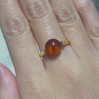 Cabochon amber ring in 14 carat gold