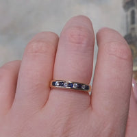 Sapphire and diamond band in 18 carat gold