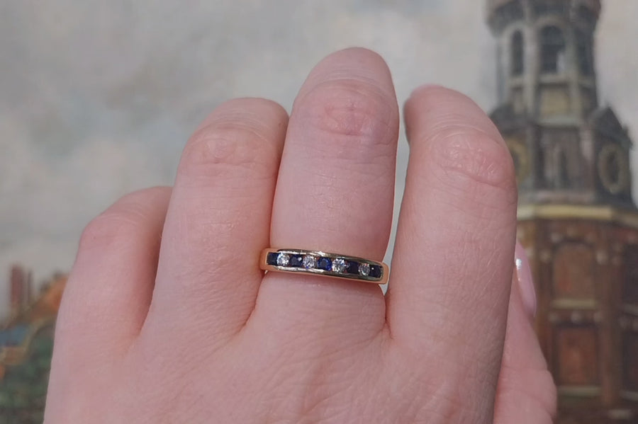 Sapphire and diamond band in 18 carat gold