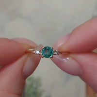 Emerald and diamond ring in 14 carat gold