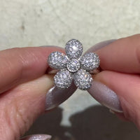 White gold flower ring with diamonds