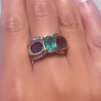 Emerald and garnet ring in 18 carat gold