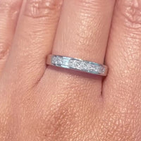 Platinum half eternity band with princess cut diamonds