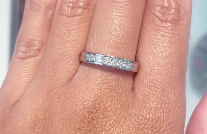 Platinum half eternity band with princess cut diamonds