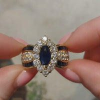 Marquise sapphire and diamond ring in 18 carat gold
