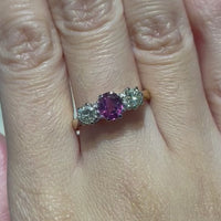 Pink sapphire and diamond three stone ring