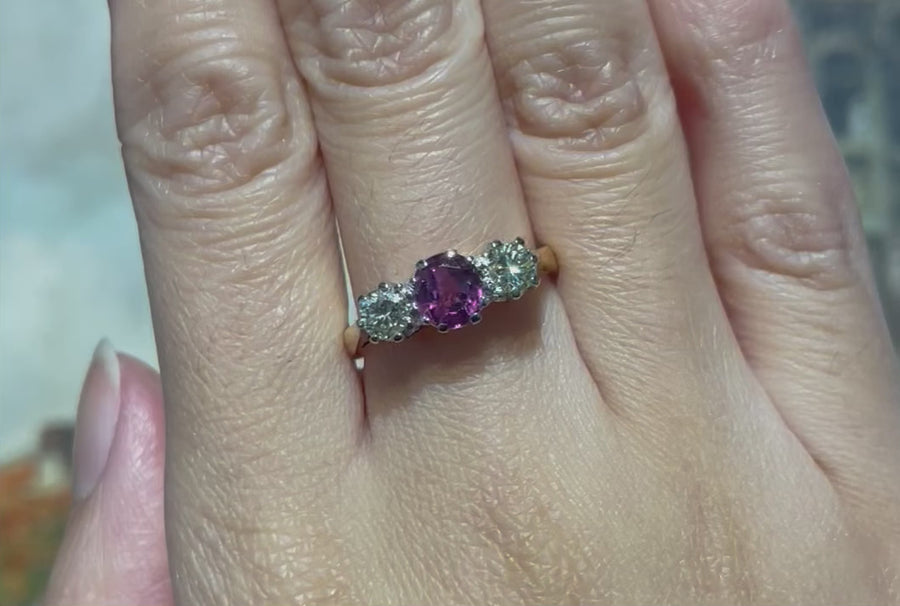 Pink sapphire and diamond three stone ring