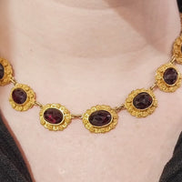 Antique garnet boat collier in 18 carat gold