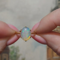 Cabochon opal ring in 18 carat gold