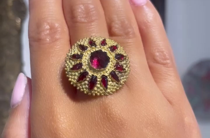 Garnet sun burst ring in 14 carat gold