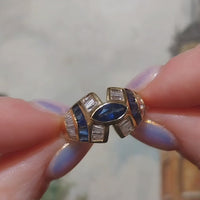 Sapphire and baguette cut diamond ring