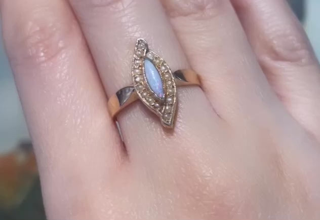 Marquise opal and seed pearl ring in 14 carat gold