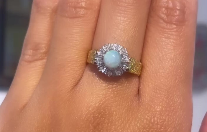 Opal and diamond ring in 18 carat gold