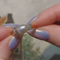 Baroque pearl and diamond ring in 18 carat gold