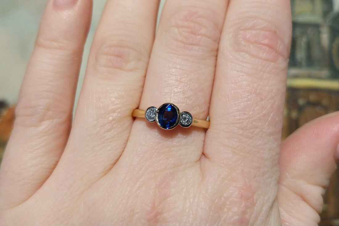 Sapphire and diamond three stone ring