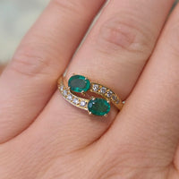Vintage emerald and diamond crossover ring